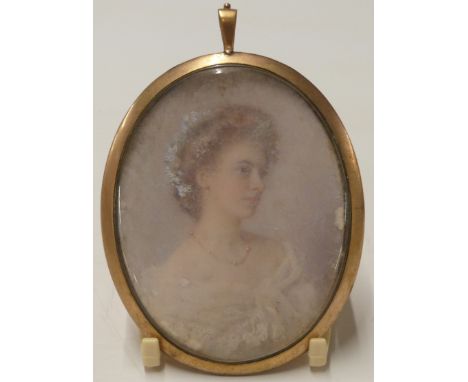 Early 20thC portrait miniature young woman with flowers in her hair