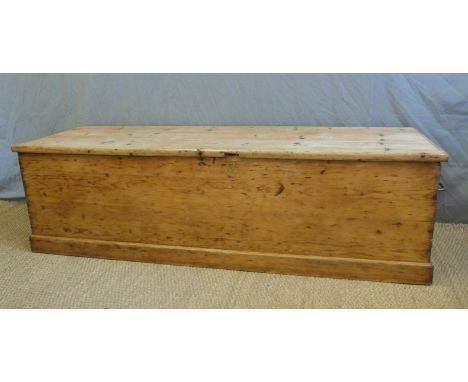 An exceptionally large 19thC pine trunk with looped carry handles, we are advised by the vendor that this was the bishop's ve