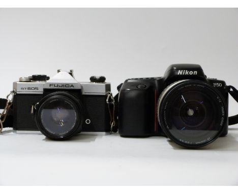 Nikon F50 SLR camera with Sigma 28-200mm lens and a Fujica ST605 SLR camera with Cosinon f= 55m F=2.1 lens 