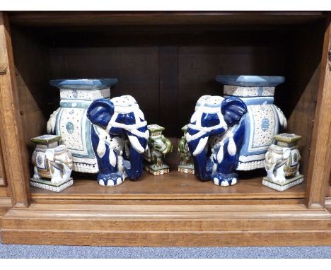 A pair of ceramic elephant seats and four smaller examples, largest H43cm