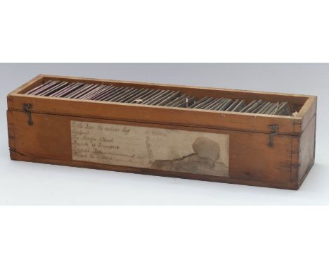 Approximately fifty vintage coloured Magic Lantern storybook or educational slides in wooden box 