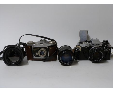 Olympus OM10 SLR camera with 50mm 1:1.8 lens, Miranda 70-210mm 1:4.5-5.6 and 35-70mm 1:3.5-4.8 lenses, further accessories, b