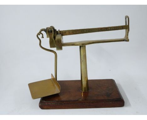 Brass cantilever postage scale with sliding weight