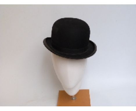 A hunting bowler hat by Battersby, London, approximate size 7