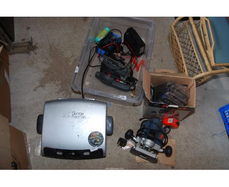 A router with attachments (running at time of lotting), two battery chargers and Power Devil sander (Sander SOLD as SEEN).