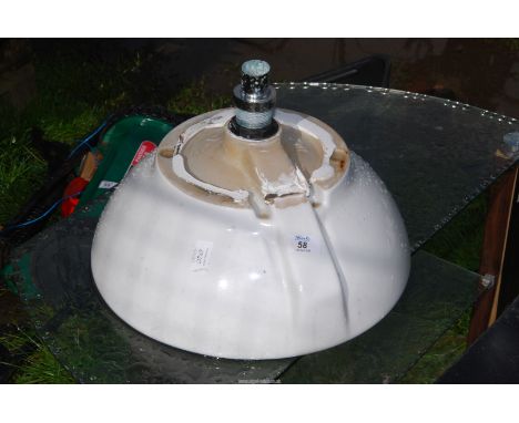 A circular wash hand basin.