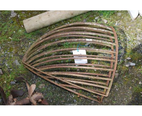 Two vintage metal corner Hay Racks.