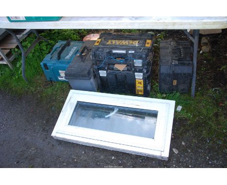 A quantity of tool boxes and a double glazed window casing, 33'' x 16''.