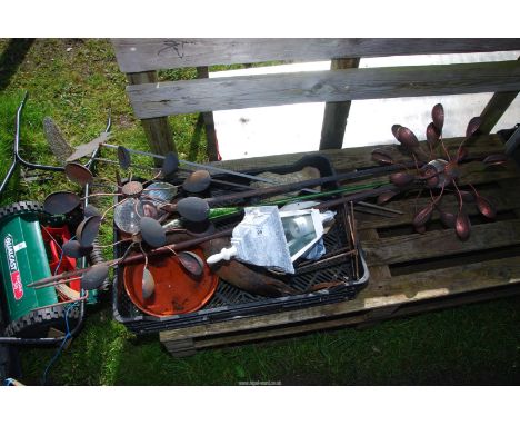 Garden stakes, wind-wheel/turbine garden features, a Heron, a light, etc.,