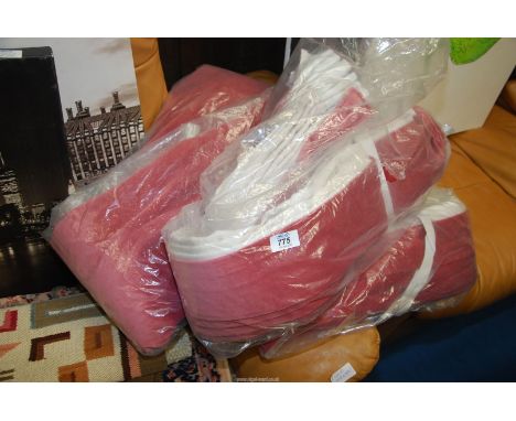 A pair of long pink curtains.