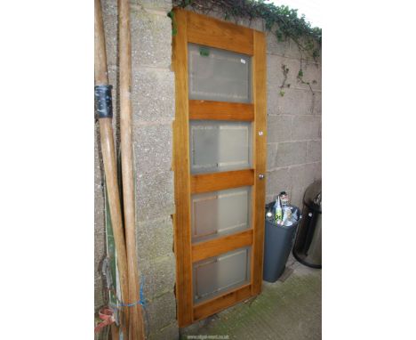 A glazed panel door, 78'' x 30'' wide.