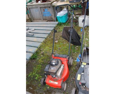A "Mowerland" four stroke self-propelled Mower with Briggs & Stratton engine (good compression).