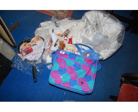 A Barbie case and contents, heart shaped frying pan, bed linen and curtains.