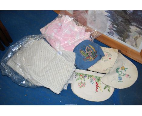 A quantity of tea cosies, towel, curtains etc.