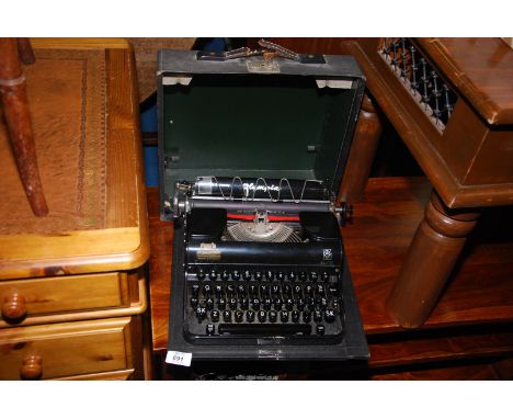 An Olympic cased typewriter.