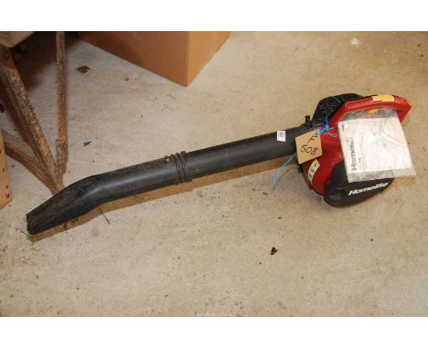 A Homelite petrol blower vac with manual, good compression.