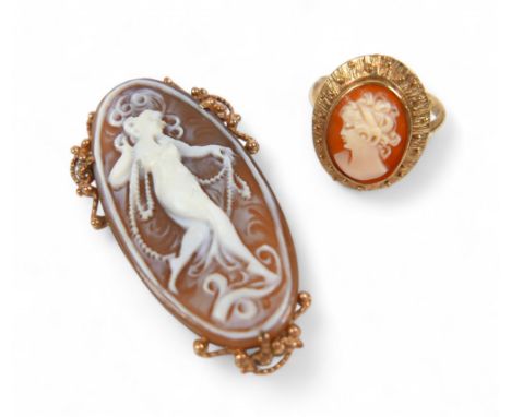 A 9ct yellow gold brooch and a ring, brooch measures 24 by 8 by 43mm, ring size N, total weight 8.9g.