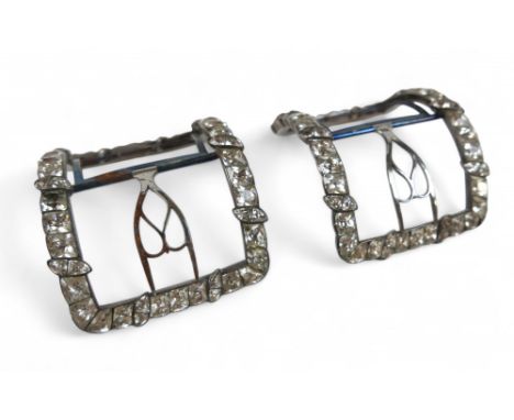 A fine pair of Georgian steel and paste set shoe buckles, set with black dot paste in gadrooned style border, larger 'stones'