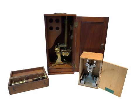 A large Victorian John Browning brass binocular microscope, in wooden box, together with a smaller boxed binocular microscope