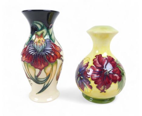 Two pieces of Moorcroft pottery, comprising an Anna Lily vase, 1998, stamped to the base, 19.5cm high, together with a 'Hibis