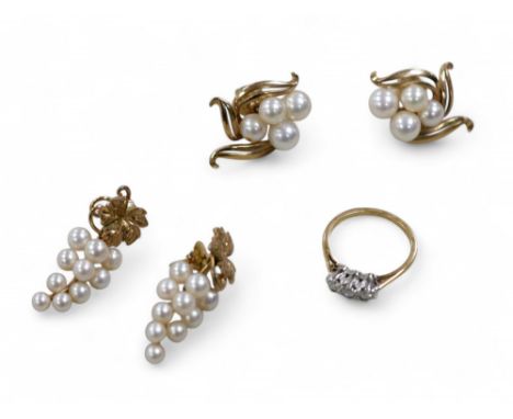 A three stone diamond ring, size K, 2.2g,  together with two pairs of gilt metal mounted pearl earrings. (1 bag)