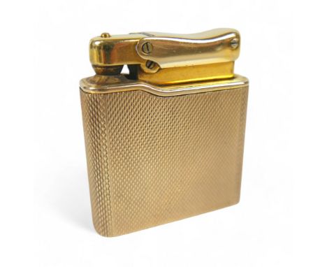 A 9ct gold cased Colibri Monogas lighter, with engine turned decoration, 72.4g gross weight, 9ct gold case 18.2g, 4.7 by 4.2 
