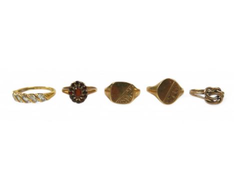 Five gold rings, comprising four 9ct rings 8.7g and an 18ct dress ring size R 3.3g. (5)