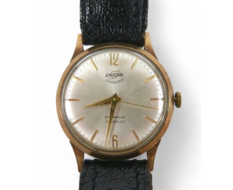 A 9ct yellow gold Enicar Ultrasonic wristwatch, manual wind 23 jewel movement, 29mm case on leather strap, total weight 27.4g