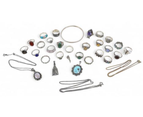 A collection of silver jewellery, comprising rings, necklaces, pendants and a bangle. (28)