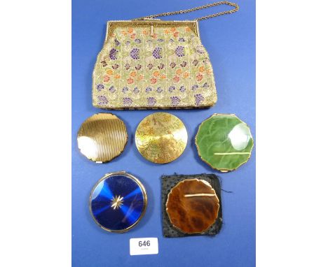 Five various compacts including Stratton and a vintage textile handbag 