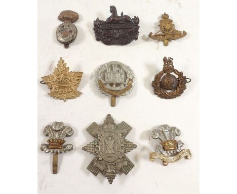 A 9th Battalion Highland Light Infantry cap badge and other cap badges 