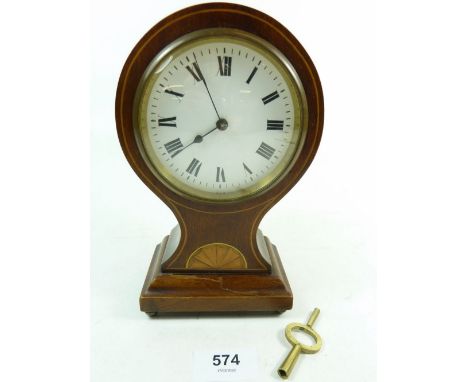 An Edwardian mahogany balloon clock with French movement and key, 19cm 
