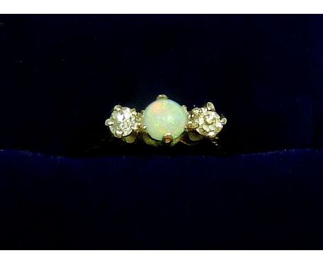 An 18ct gold opal and old cut diamond ring, Size I, 1.5g 