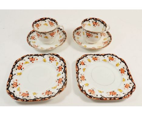 A Shore &amp; Coggins part tea service comprising ten tea cups and twelve saucers and twelve tea plates with floral decoratio