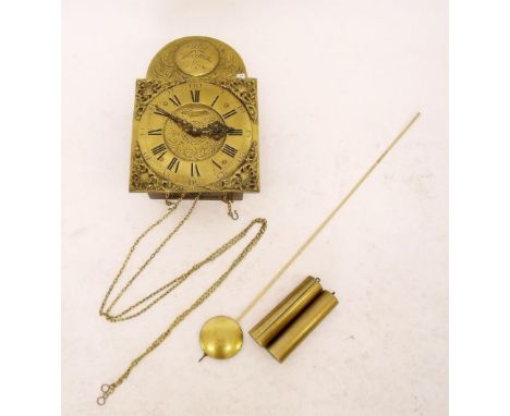 A German brass arch top wall clock with eight day striking movement, pendulum etc 