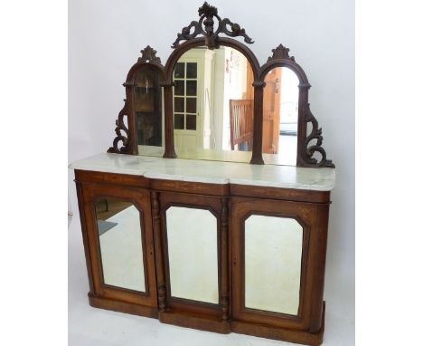 A Victorian marble topped mahogany mirror back side cabinet of small proportions, with carved decoration, 135cm wide 