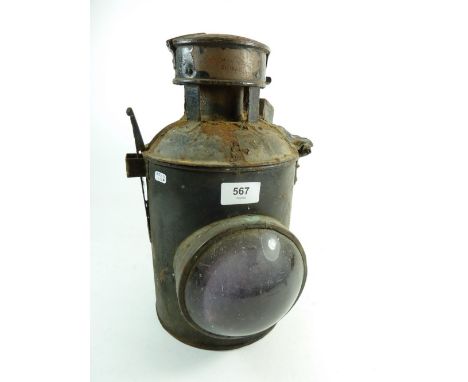 An old lantern - possibly a railway lamp 1920 with bulls eye lens 