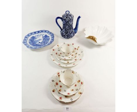 A Carlton Ware shell form dish, a Royal Doulton prunus blossom coffee pot, a Cauldon plate and two floral printed trios 