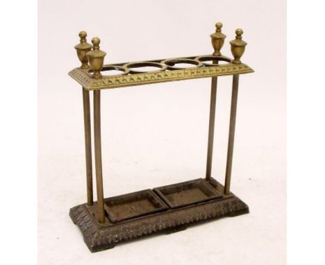 A 19th century brass and cast iron stick stand