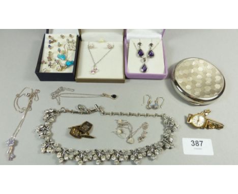 A collection of silver and costume jewellery including earrings, necklaces, cufflinks etc together with a compact and an Oris