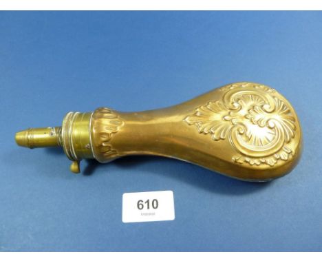 A brass powder flask with embossed decoration, 21.5cm 