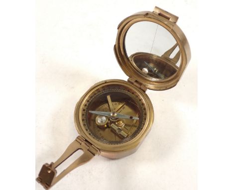 A brass reproduction compass 