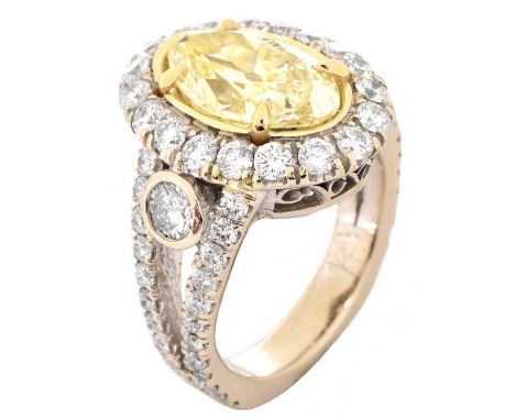 Approx. 3.46 Carat Oval Cut Fancy Light Yellow Diamond, 2.50 Carat Round Brilliant Cut Diamond, Platinum and 18 Karat Yellow 