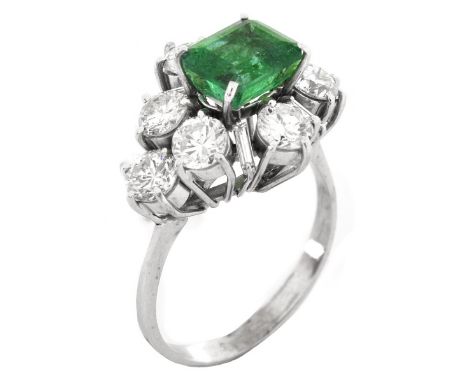 Vintage Approx. 2.0 Carat TW Round Brilliant Cut Diamond, 1.5 Carat Emerald and Platinum Ring. Diamonds G-H color, VS2 clarit