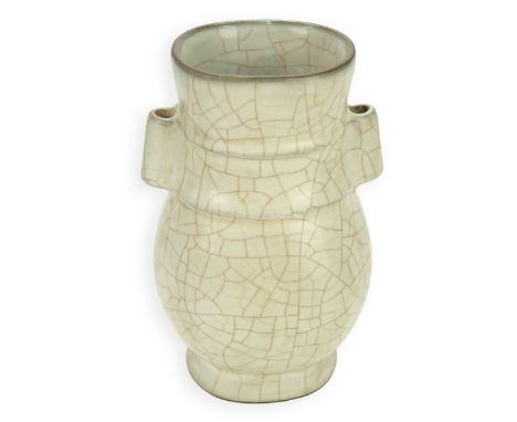 Chinese Celadon Crackle Glaze Guan Arrow Vase. Signed to base. Measures 8-1/2" H x 5" W. Condition: Good condition Estimate: 