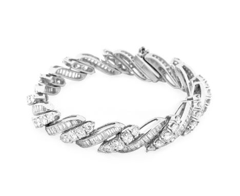 Vintage Approx. 22.0 Carat Round Brilliant and Baguette Cut Diamond and Platinum Bracelet. Diamonds D-E color, VVS-VS clarity