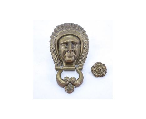 Antique American Indian Brass Door Knocker With Strike Plate. Marked REG NO 927861. Good condition. Measures 8" L. (estimate 