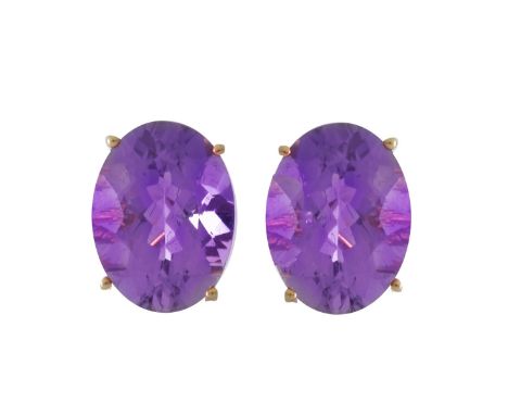 Approx. 10.0 Carat Oval Cut Amethyst and 14 Karat Yellow Gold Earrings. Amethysts measure 16mm x 12mm. Stamped 14K. Approx. w