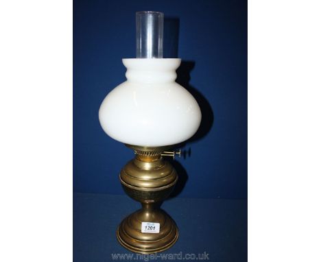 A brass and glass oil Lamp