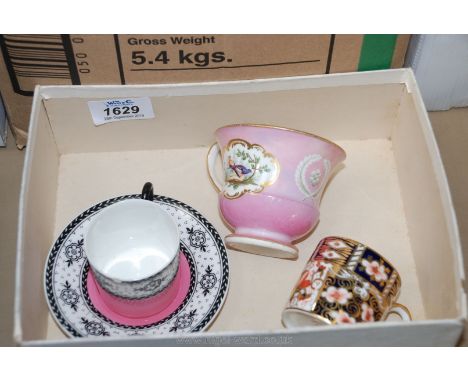 A Minton teacup, a Royal Worcester teacup and saucer and a Royal Crown Derby cup, all a/f.
